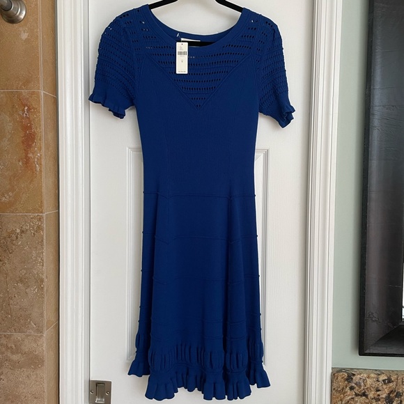 wrap dress knit Kiyonna Women's Plus Size Sweetheart Knit Wrap Dress with 3/4 Sleeves, Navy Blue, 0X main image 1